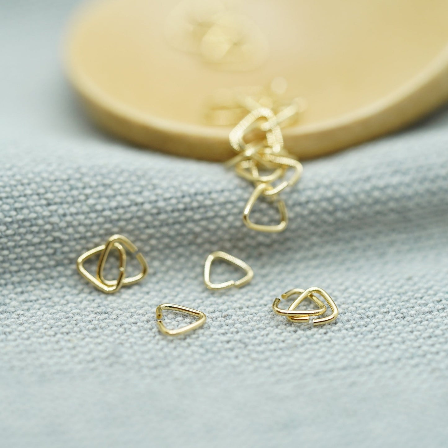 300Pcs 14Kt Gold Plated Triangle Jump Rings 5mm for jewelry making - onesika